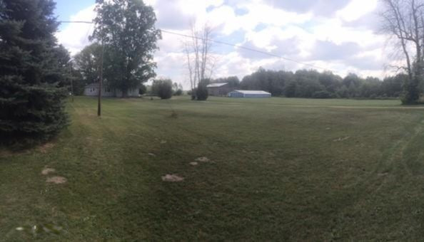 2886 South Sullivan Road Ravenna, MI 49451 - Photo 1 of 28 Sullivan Rd exterior yard and hosue