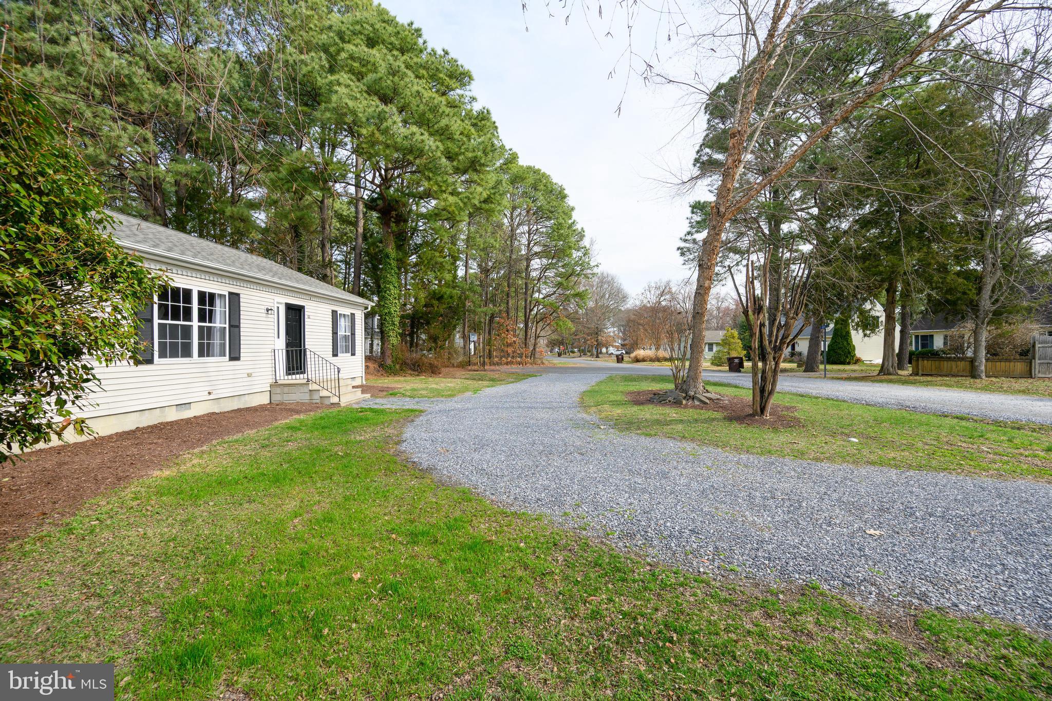 100 Bush Terrace St. Michaels, MD 21663 - Photo 4 of 40 a view of a house with a backyard