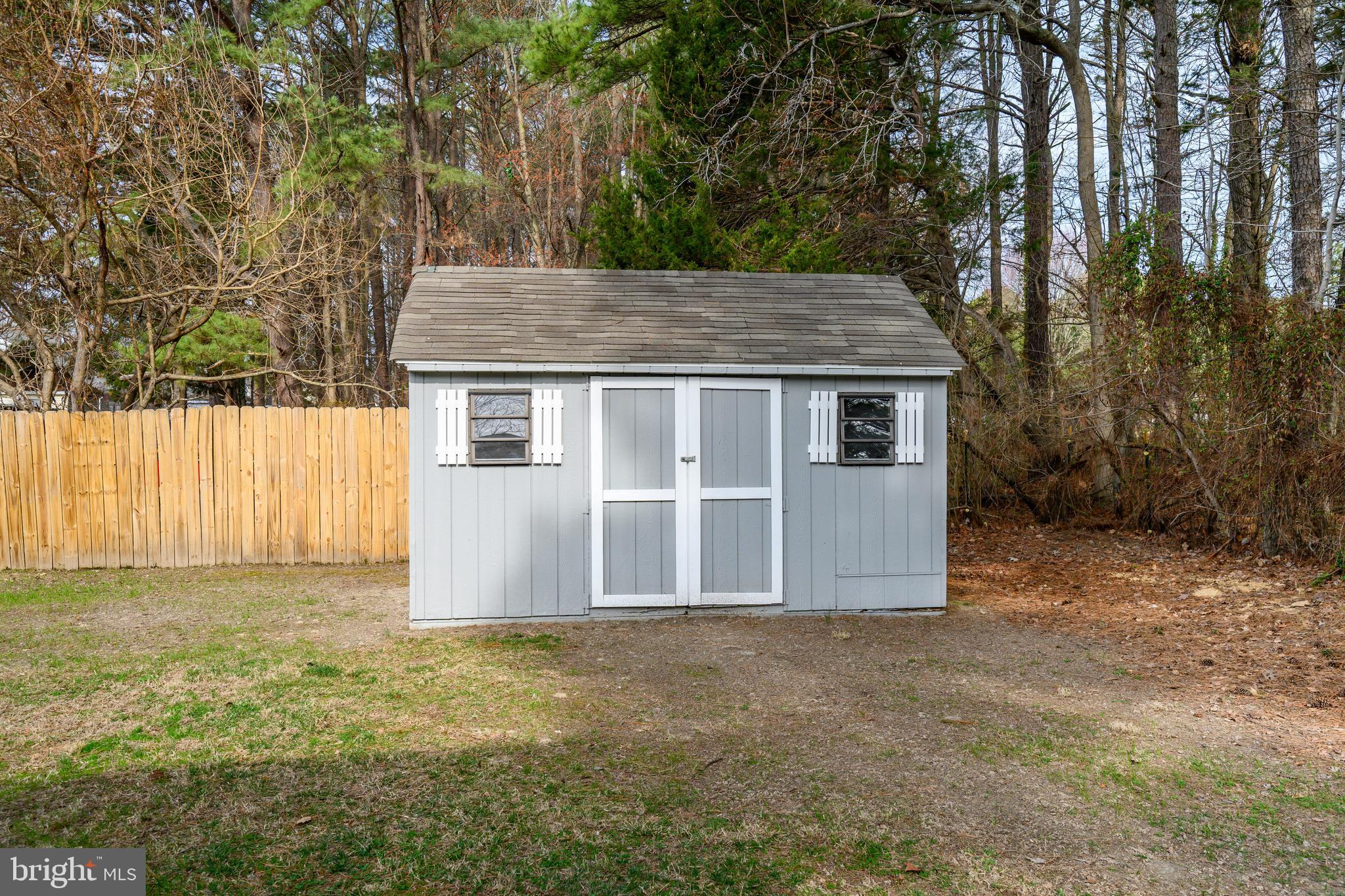 100 Bush Terrace St. Michaels, MD 21663 - Photo 7 of 40 a house view with a backyard space