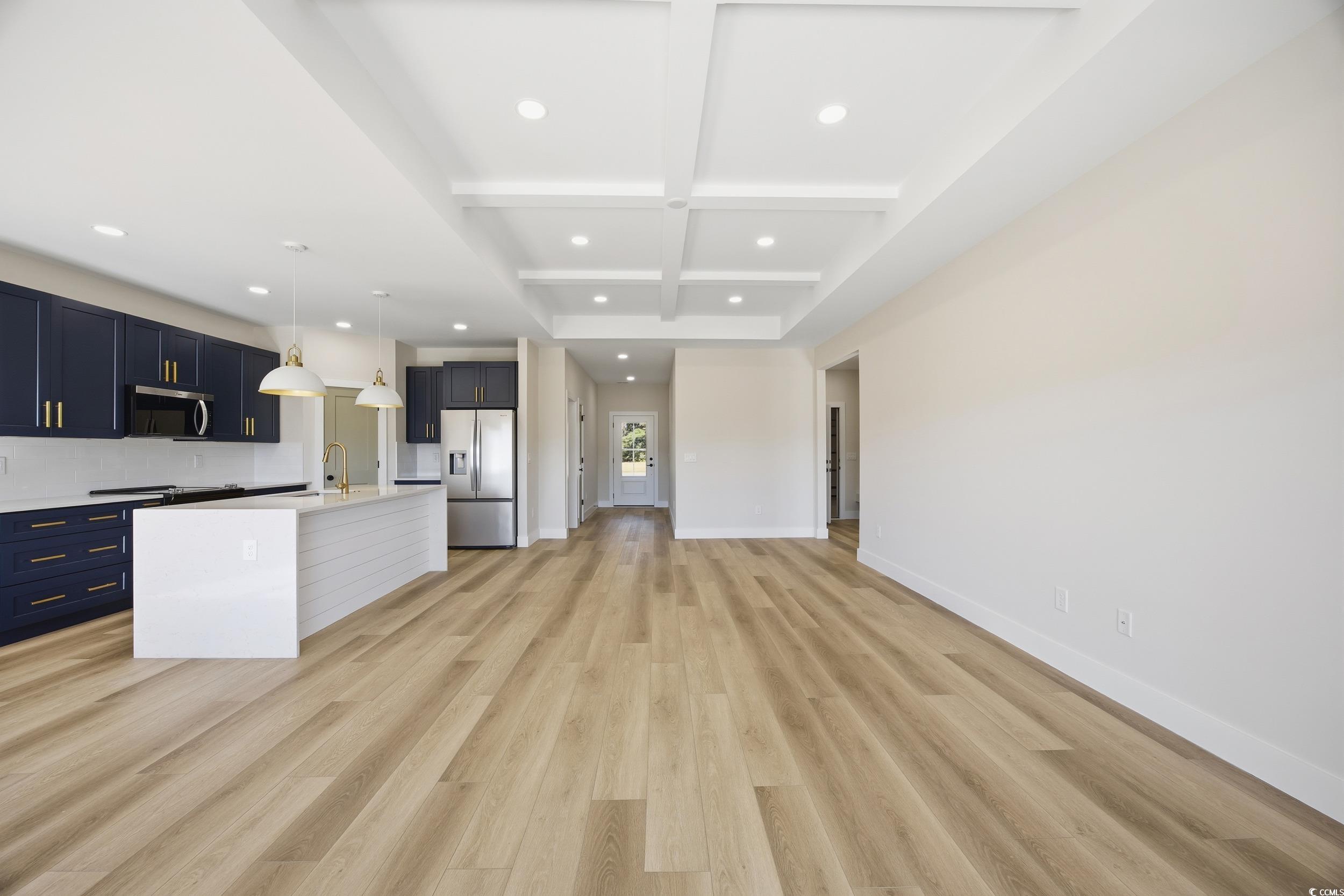 631 Highway 548 Conway Sc 29527 Conway, SC 29527 - Photo 40 of 40 Kitchen featuring beam ceiling, open floor plan, coffered ceiling, light wood-style floors, and recessed lighting