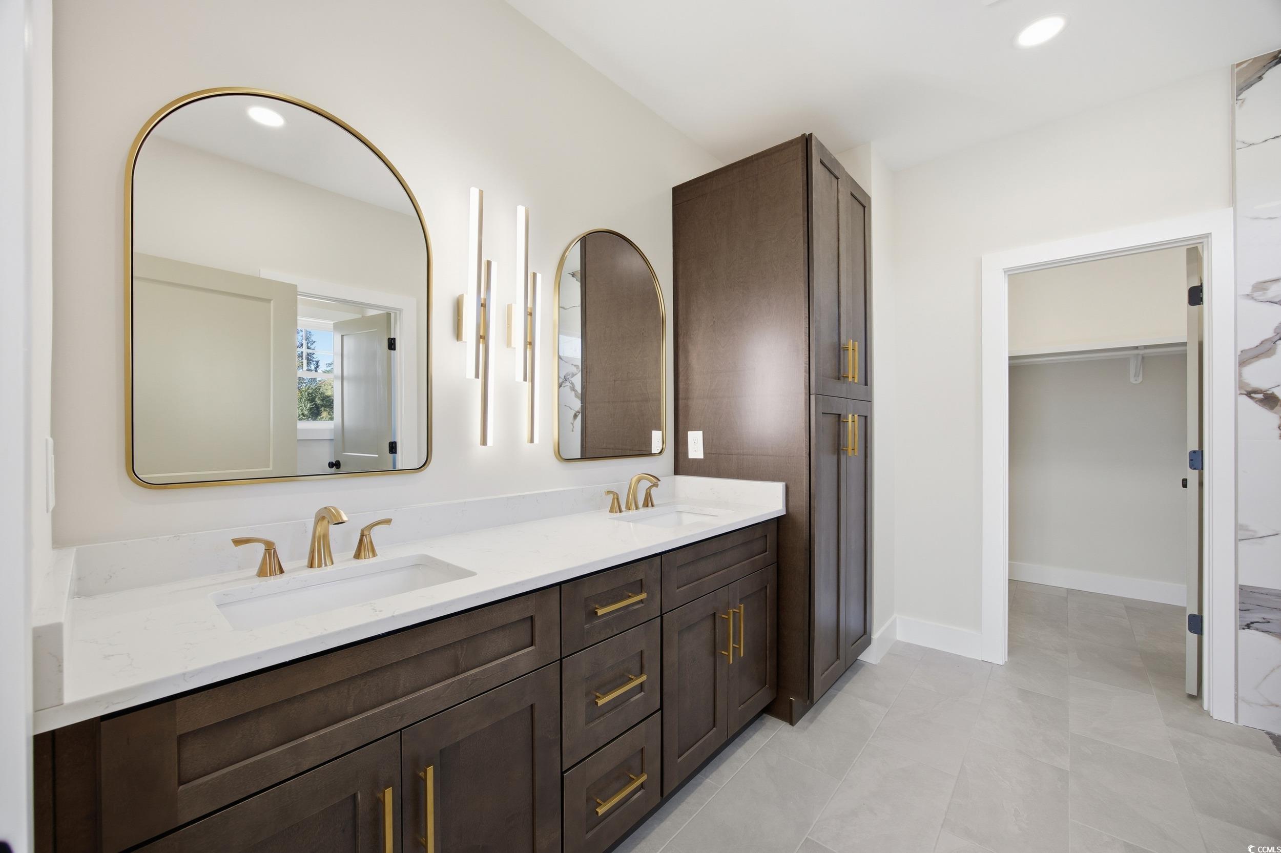 631 Highway 548 Conway Sc 29527 Conway, SC 29527 - Photo 17 of 40 Full bathroom with double vanity, a walk in closet, and recessed lighting