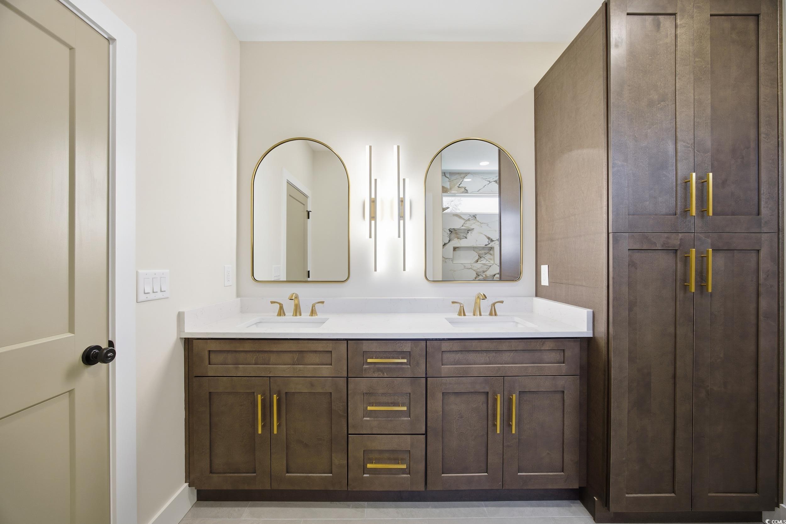 631 Highway 548 Conway Sc 29527 Conway, SC 29527 - Photo 19 of 40 Bathroom with double vanity and baseboards