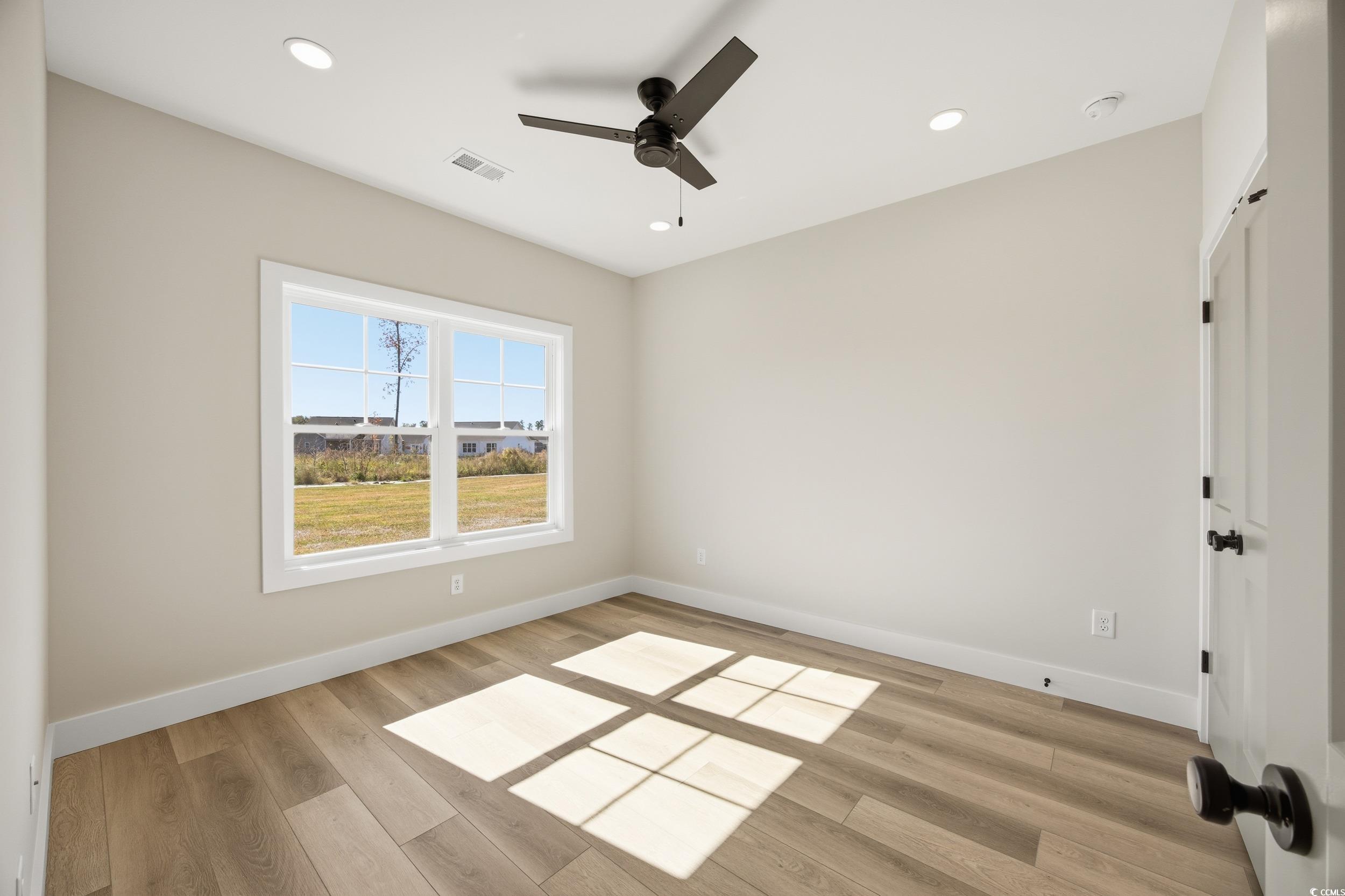 631 Highway 548 Conway Sc 29527 Conway, SC 29527 - Photo 20 of 40 Empty room featuring recessed lighting, light wood-style flooring, and ceiling fan