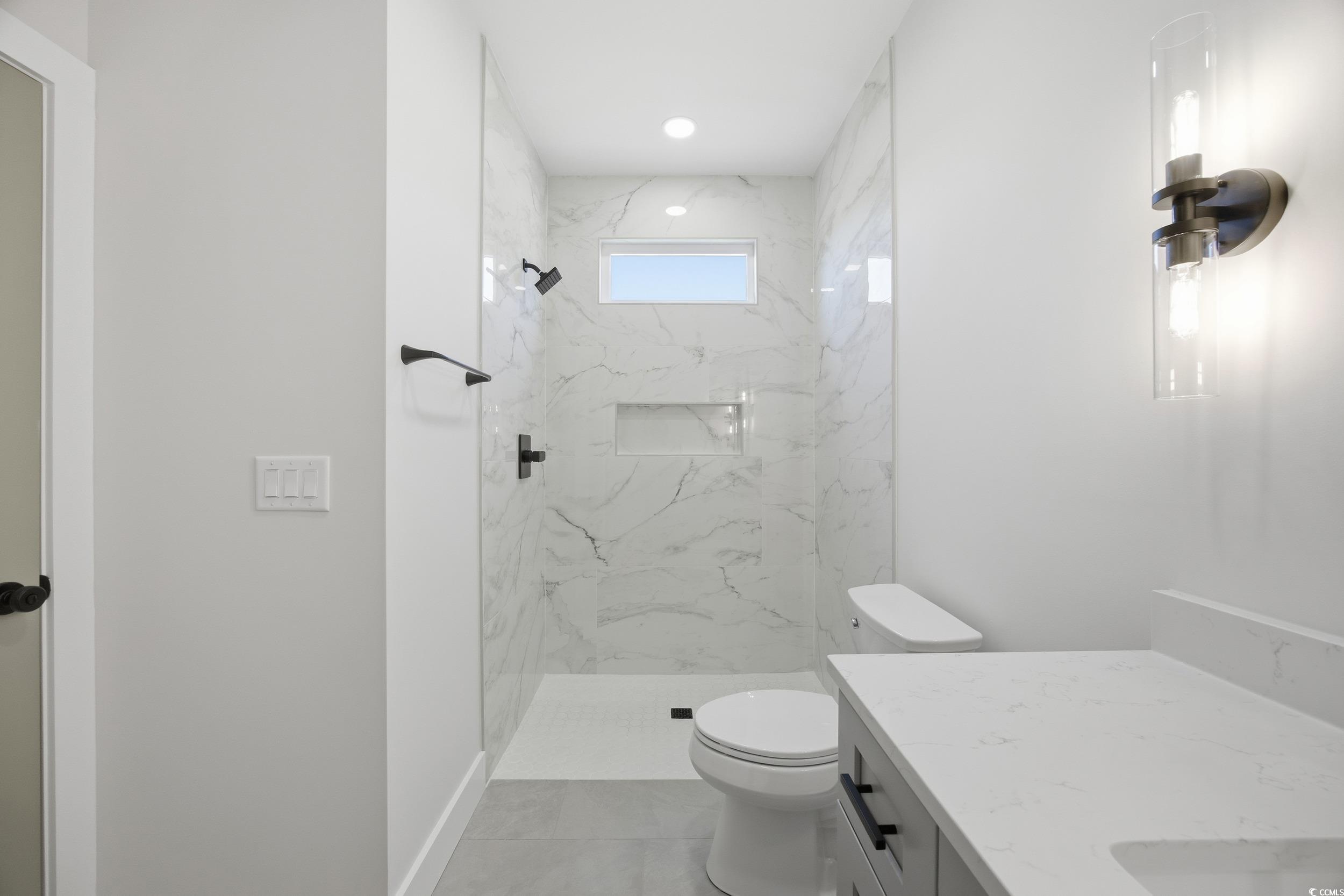 631 Highway 548 Conway Sc 29527 Conway, SC 29527 - Photo 23 of 40 Bathroom with a marble finish shower and vanity