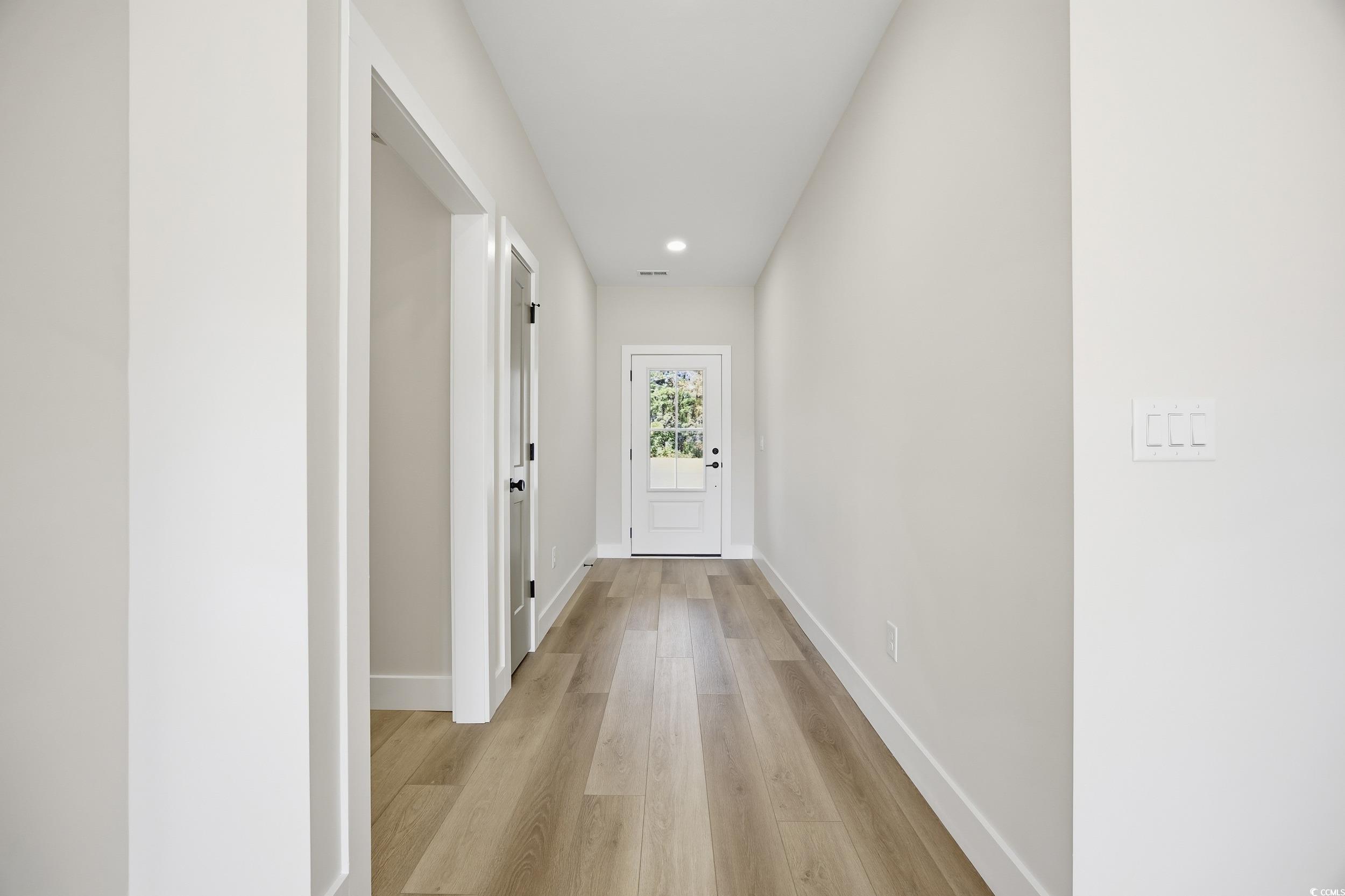 631 Highway 548 Conway Sc 29527 Conway, SC 29527 - Photo 24 of 40 Hallway featuring light wood-style flooring and recessed lighting