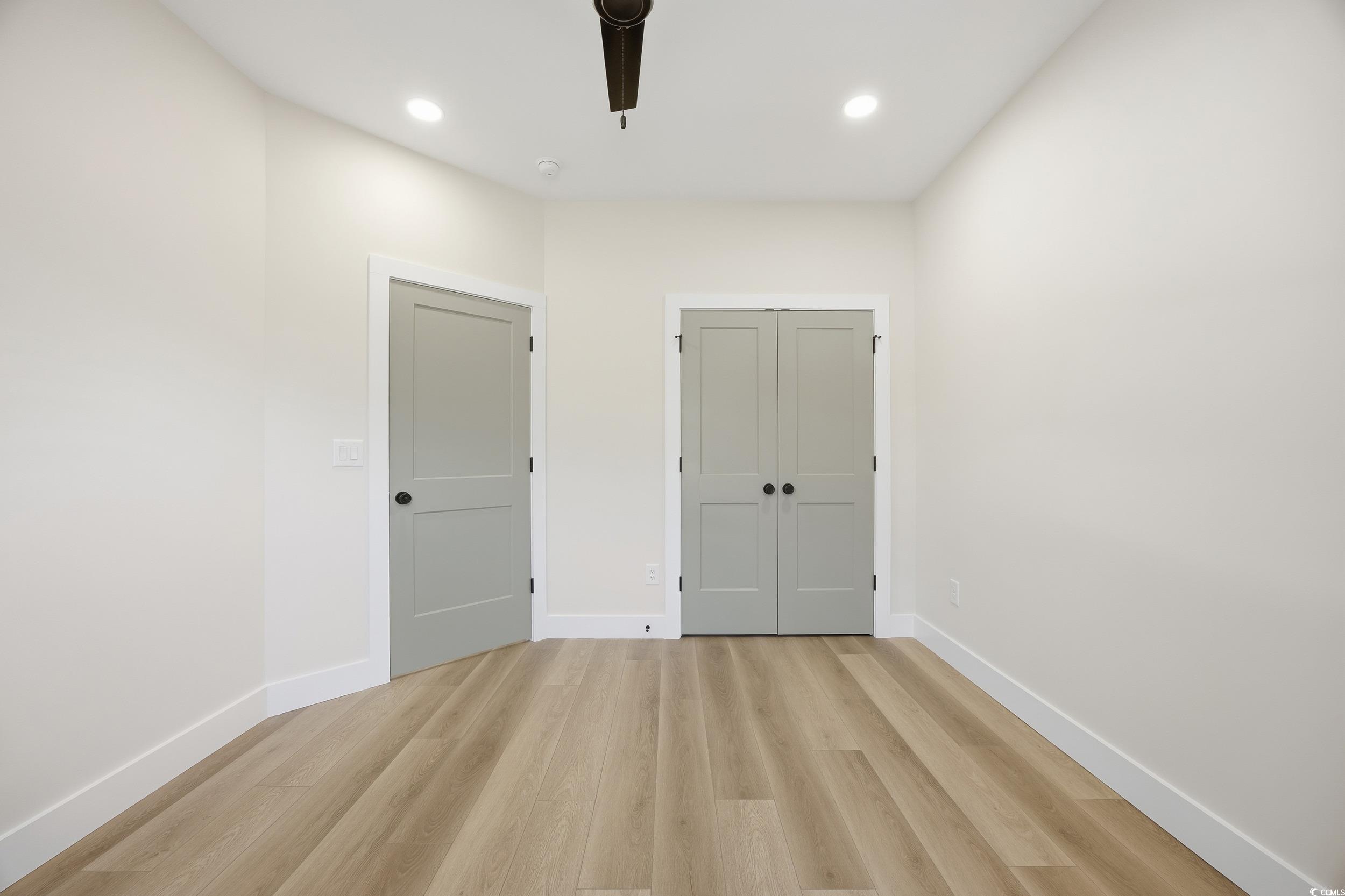 631 Highway 548 Conway Sc 29527 Conway, SC 29527 - Photo 28 of 40 Unfurnished bedroom featuring light wood-style flooring, a closet, recessed lighting, and ceiling fan