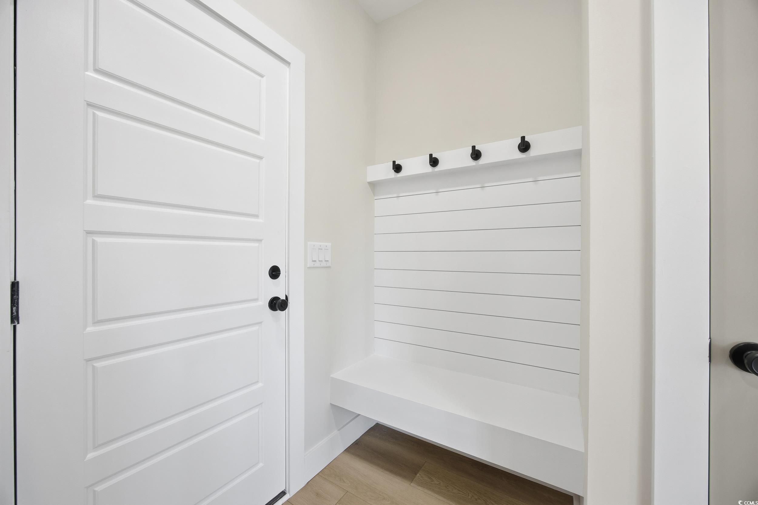 631 Highway 548 Conway Sc 29527 Conway, SC 29527 - Photo 30 of 40 Mudroom featuring light wood-style floors and baseboards