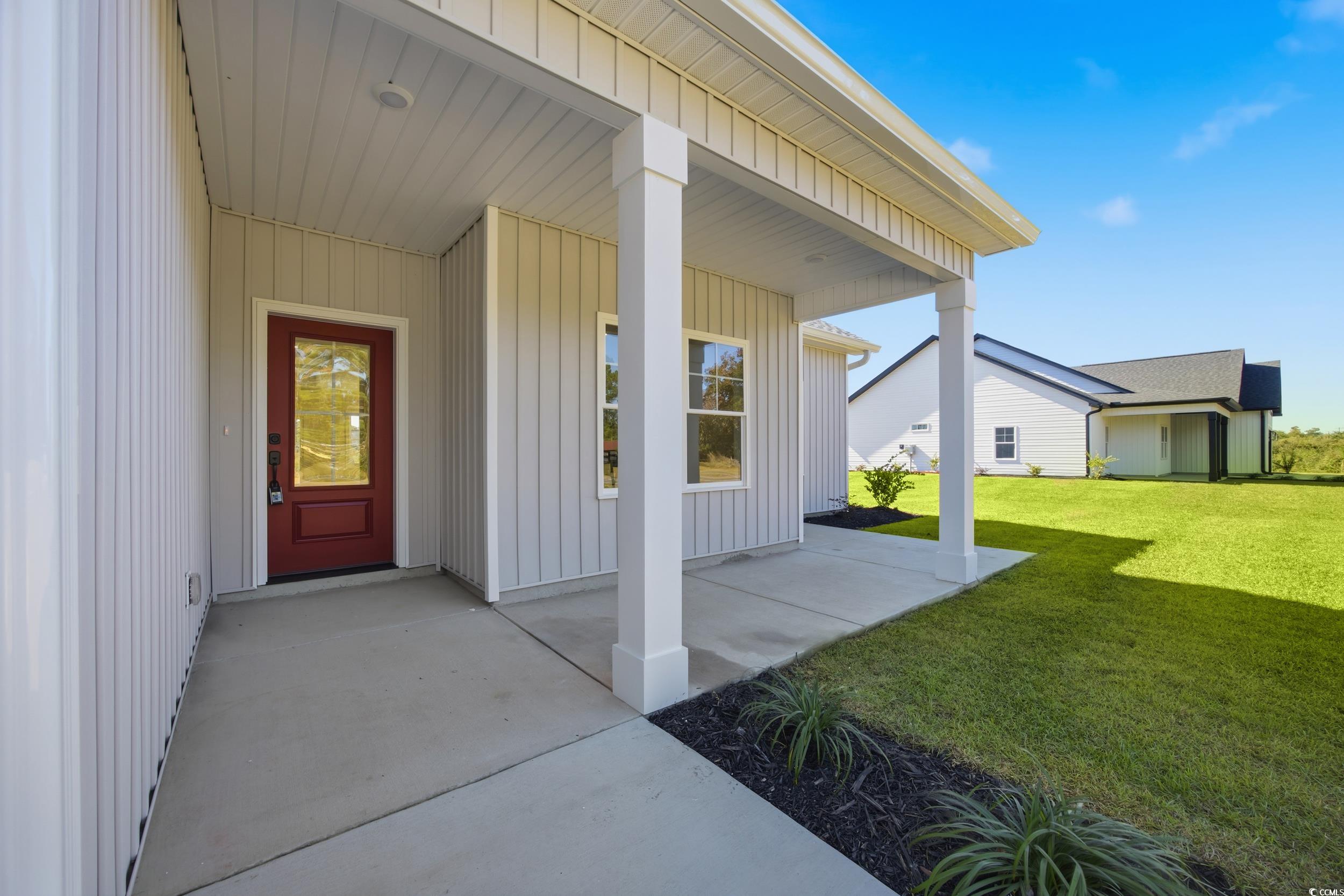 631 Highway 548 Conway Sc 29527 Conway, SC 29527 - Photo 4 of 40 Entrance to property featuring covered porch and a yard