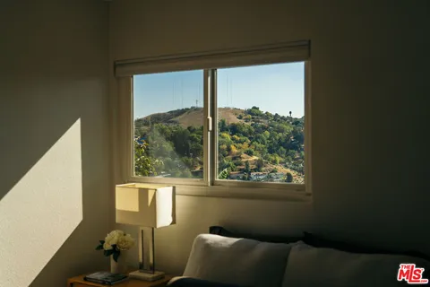 a view of a room with a window