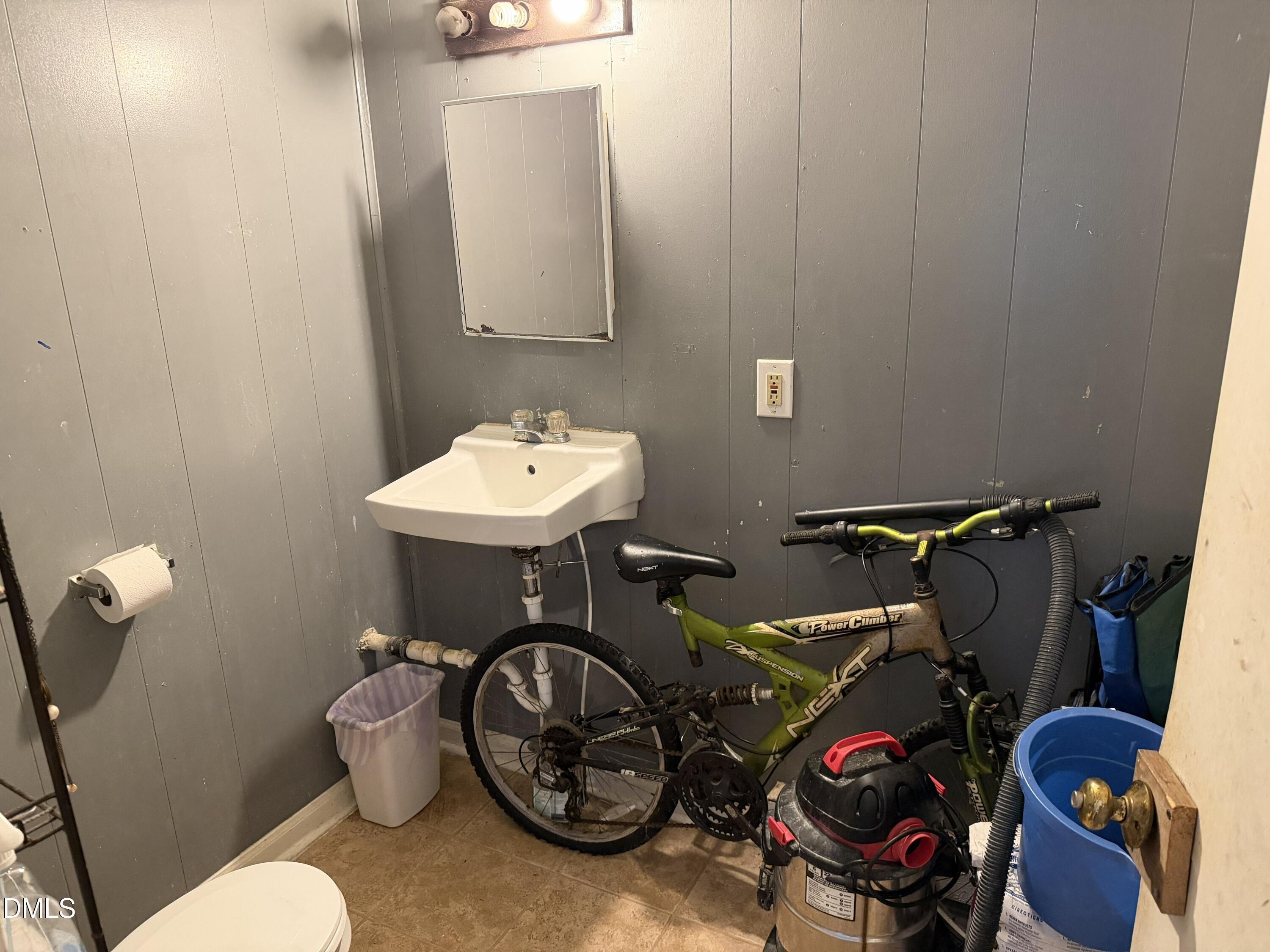 927 Berkeley Street Durham, NC 27705 - Photo 11 of 13 a view of a room with gym equipment