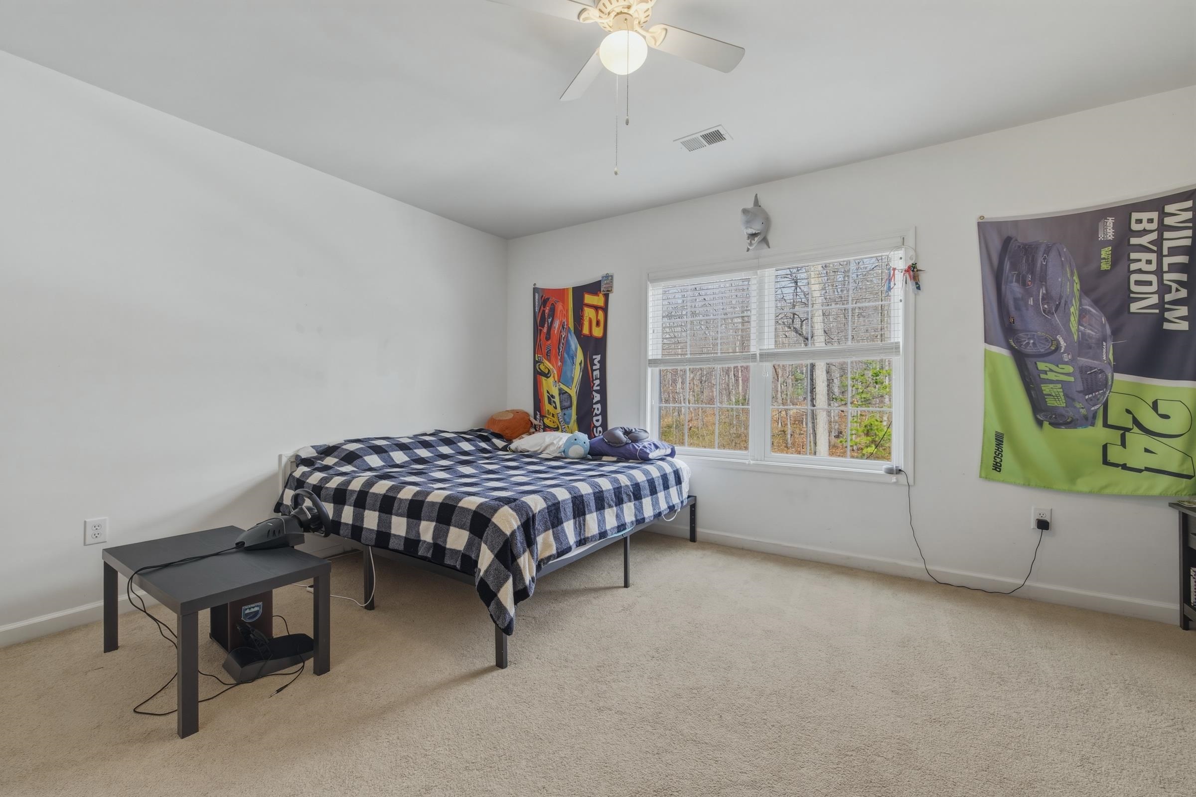 257 Hunter Road Maurertown, VA 22644 - Photo 29 of 61 a bedroom with a bed dresser and a window