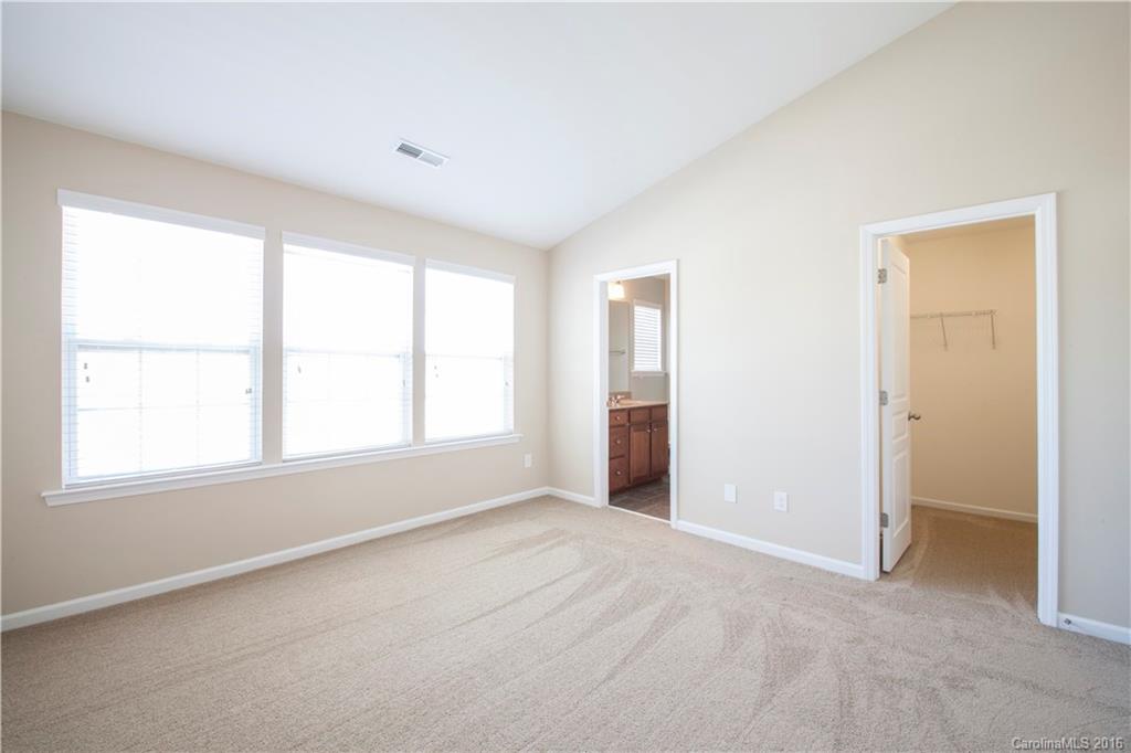 228 Falling Ridge, Unit 151 Belmont, NC 28012 - Photo 8 of 15 a view of an empty room with a window