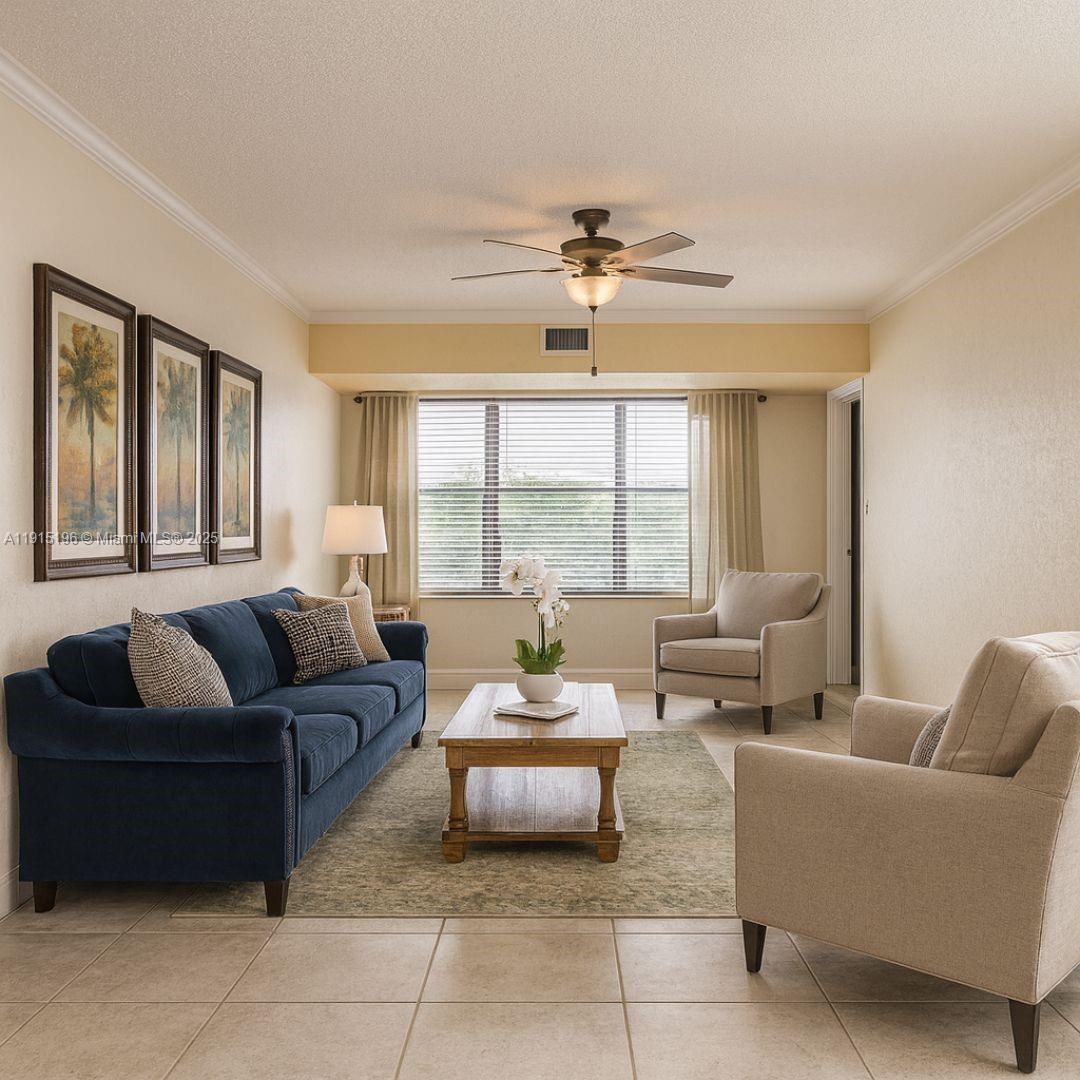 1526 Whitehall Drive, Unit 403 Davie, FL 33324 - Photo 1 of 16 a living room with furniture and a large window
