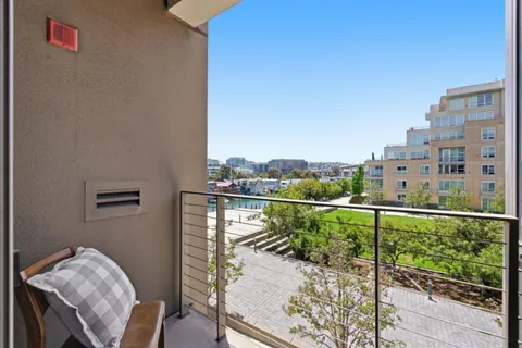 a balcony with view of city view