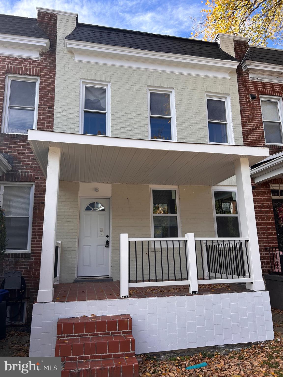 3706 Overview Road Baltimore, MD 21215 - Photo 2 of 47 a front view of a house with a yard