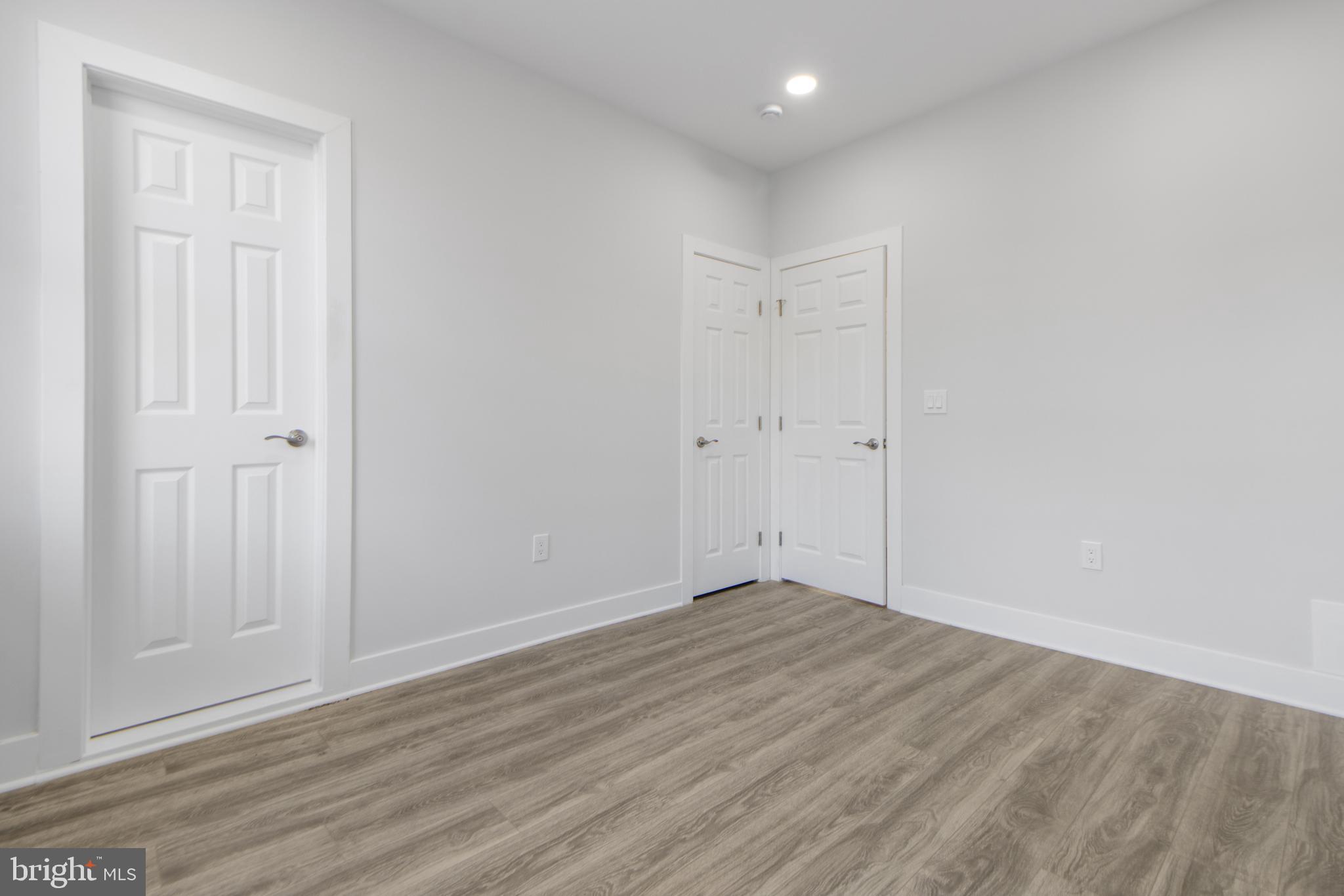 3706 Overview Road Baltimore, MD 21215 - Photo 40 of 47 a view of an empty room with wooden floor