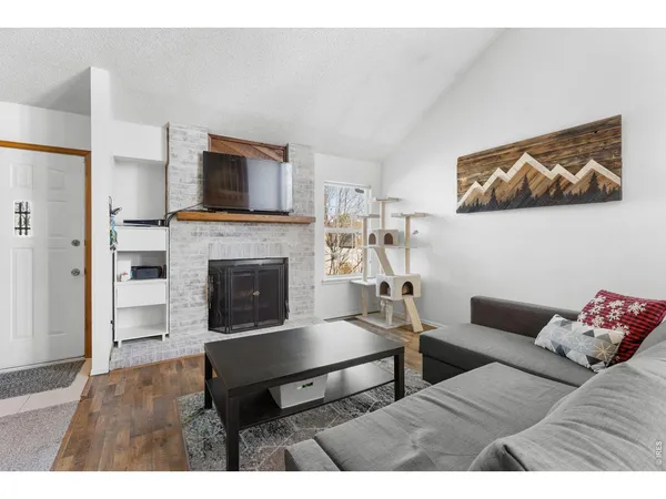 a kitchen with stainless steel appliances granite countertop a stove sink and cabinets