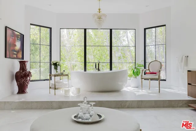 a living room with furniture and window