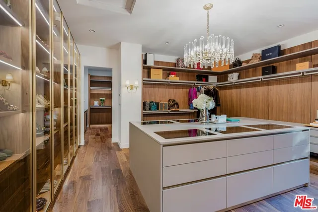 a kitchen with a sink and refrigerator