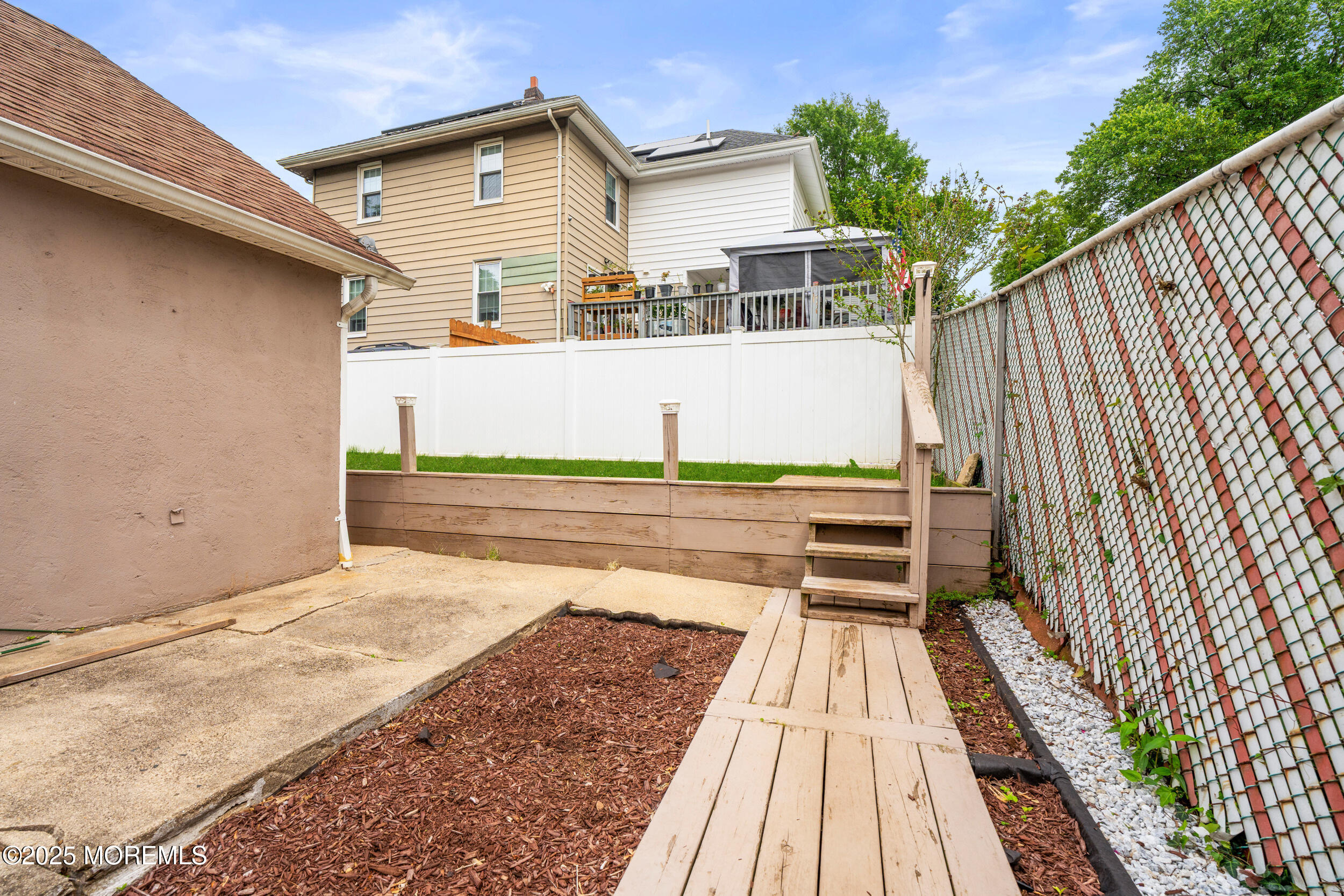 175 Shore Avenue Bogota, NJ 07603 - Photo 33 of 37 a view of a house with pool