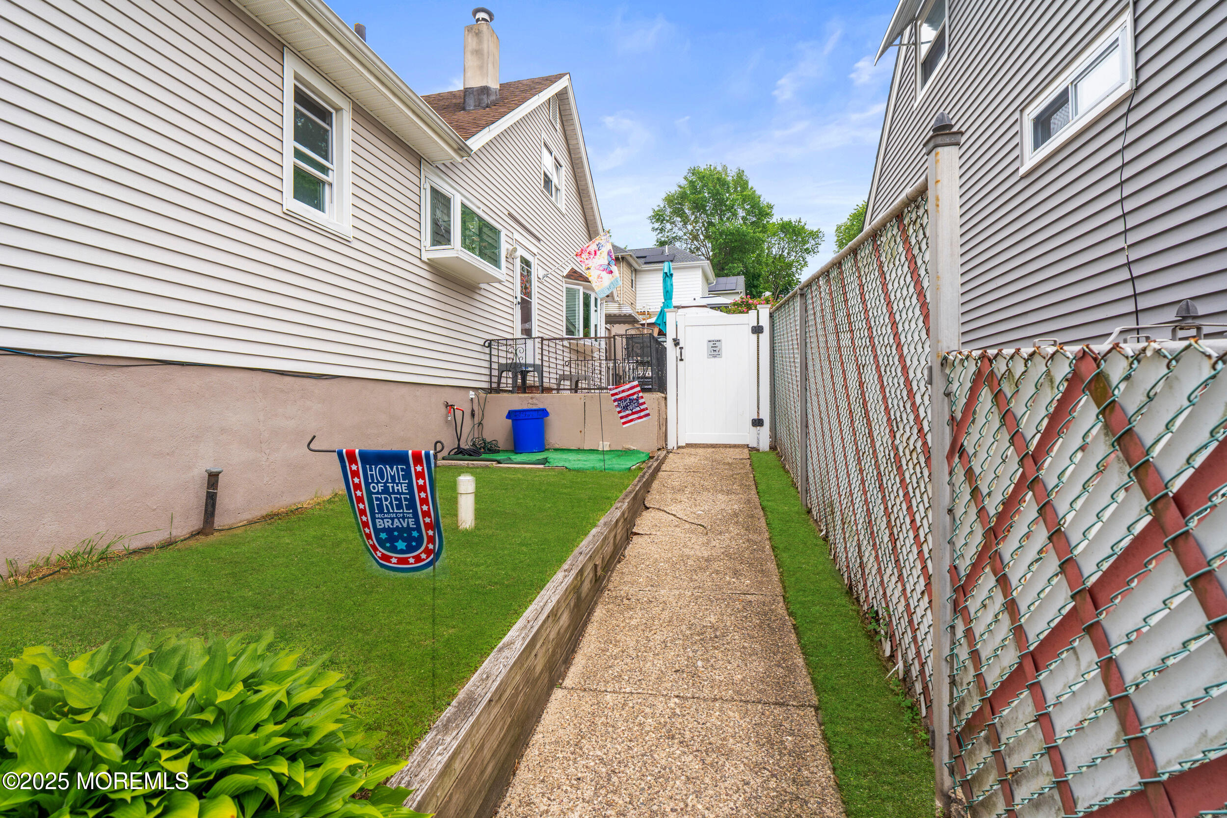 175 Shore Avenue Bogota, NJ 07603 - Photo 4 of 37 a front view of a house with a yard