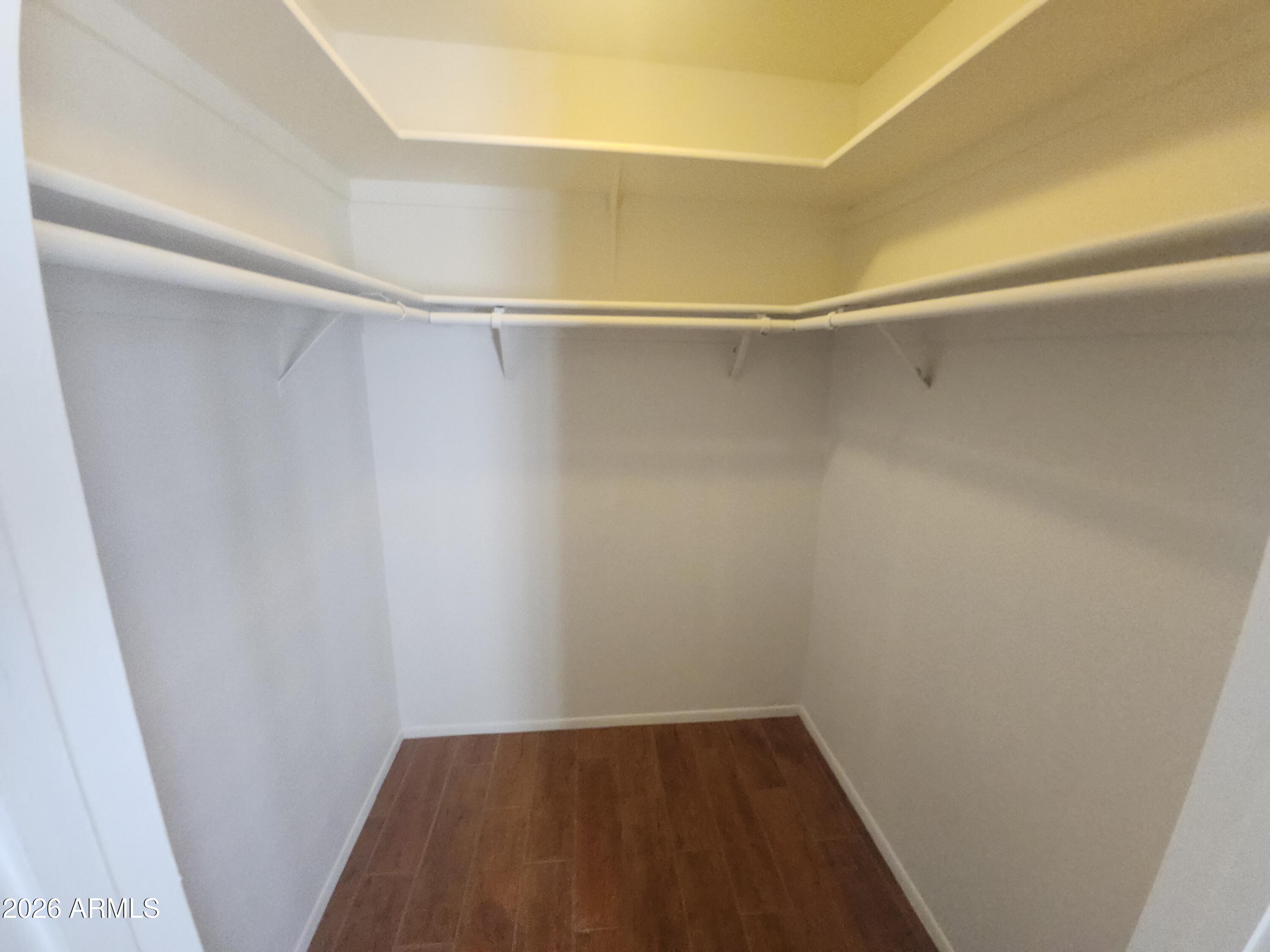 4325 East Vineyard Road Phoenix, AZ 85042 - Photo 8 of 8 a view of a room with shelf on the wall