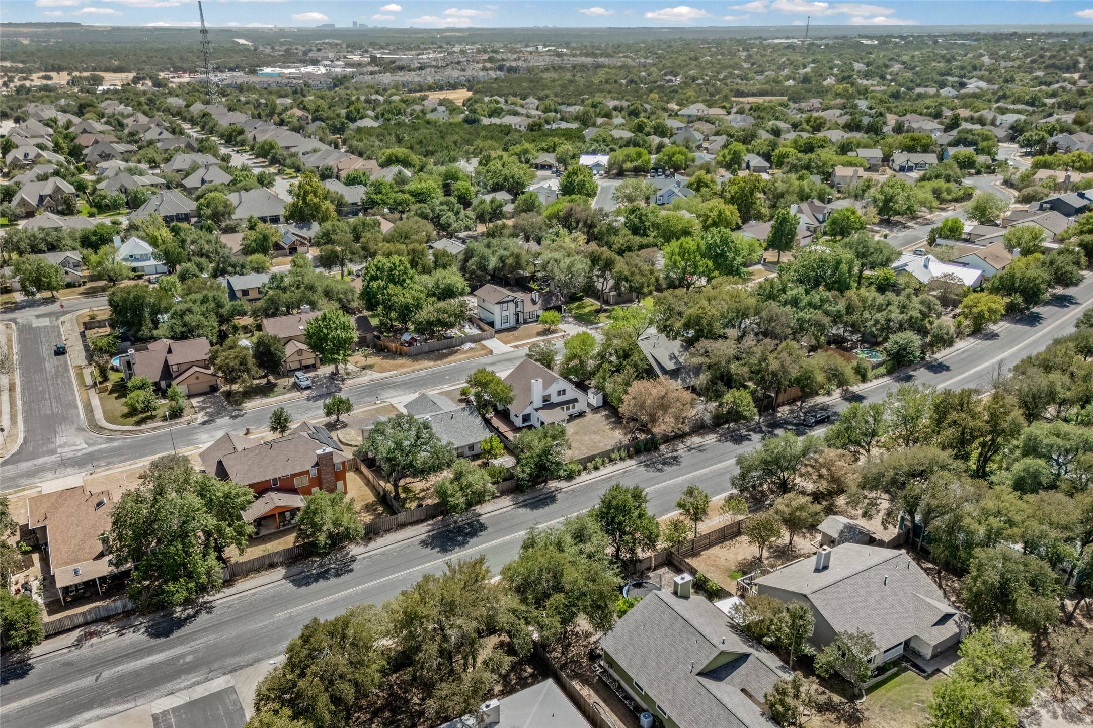 3006 Overland Street Round Rock, TX 78681 - Photo 27 of 29 Mature trees frame the peaceful residential streets of this charming established neighborhood.