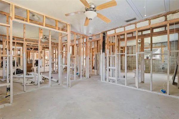 a view of an empty room with stairs
