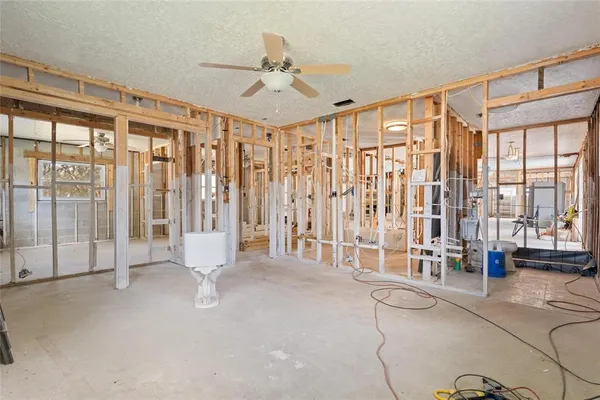 a view of an empty room with a large window