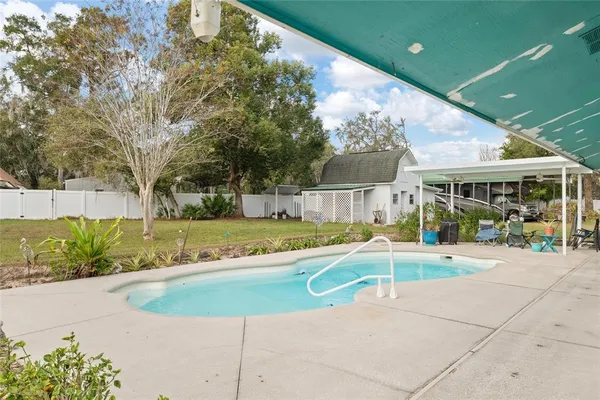 a view of a house with a swimming pool