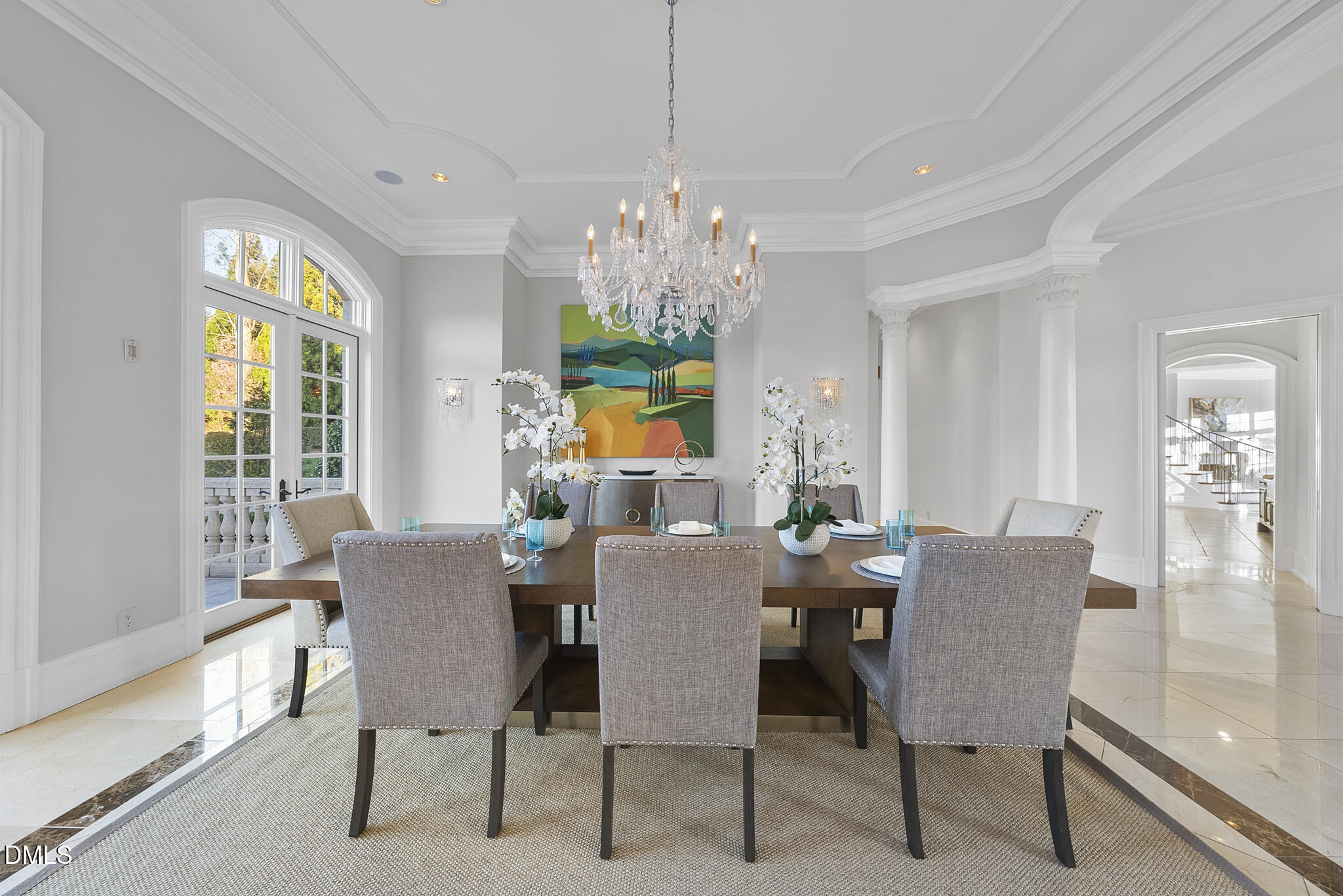 1404 Barony Lake Way Raleigh, NC 27614 - Photo 11 of 66 a dining room with furniture a chandelier and a rug