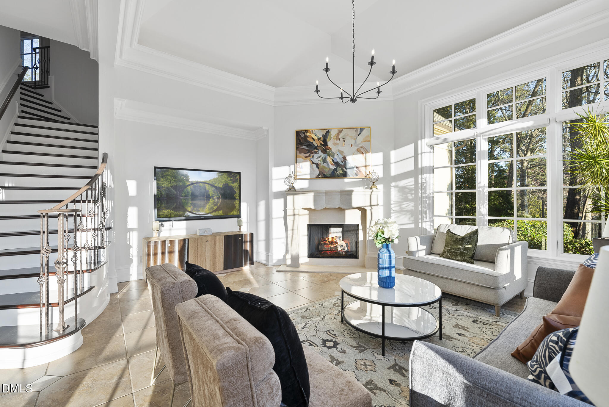 1404 Barony Lake Way Raleigh, NC 27614 - Photo 27 of 66 a living room with fireplace furniture and a flat screen tv
