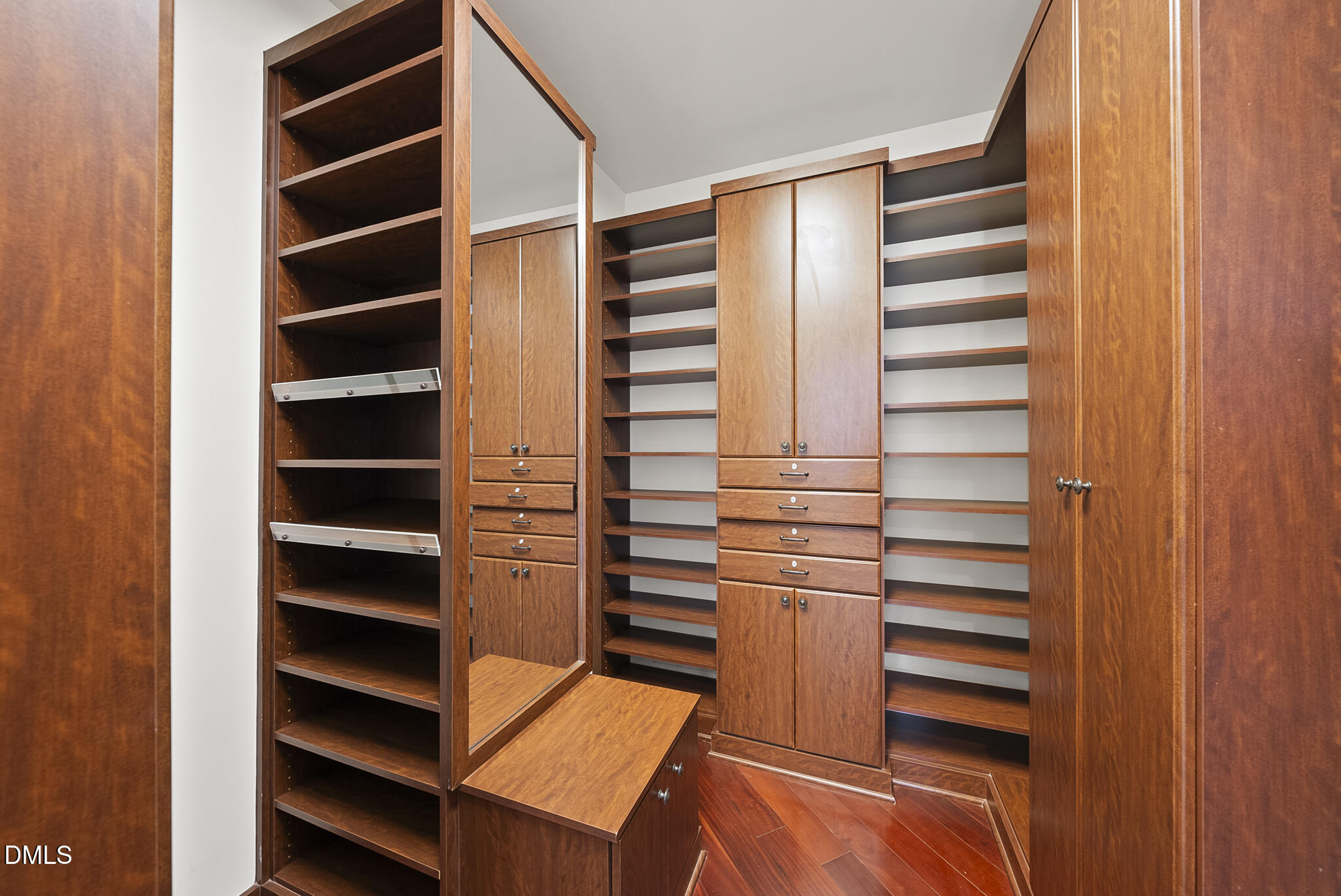 1404 Barony Lake Way Raleigh, NC 27614 - Photo 46 of 66 a view of walk in closet with empty racks