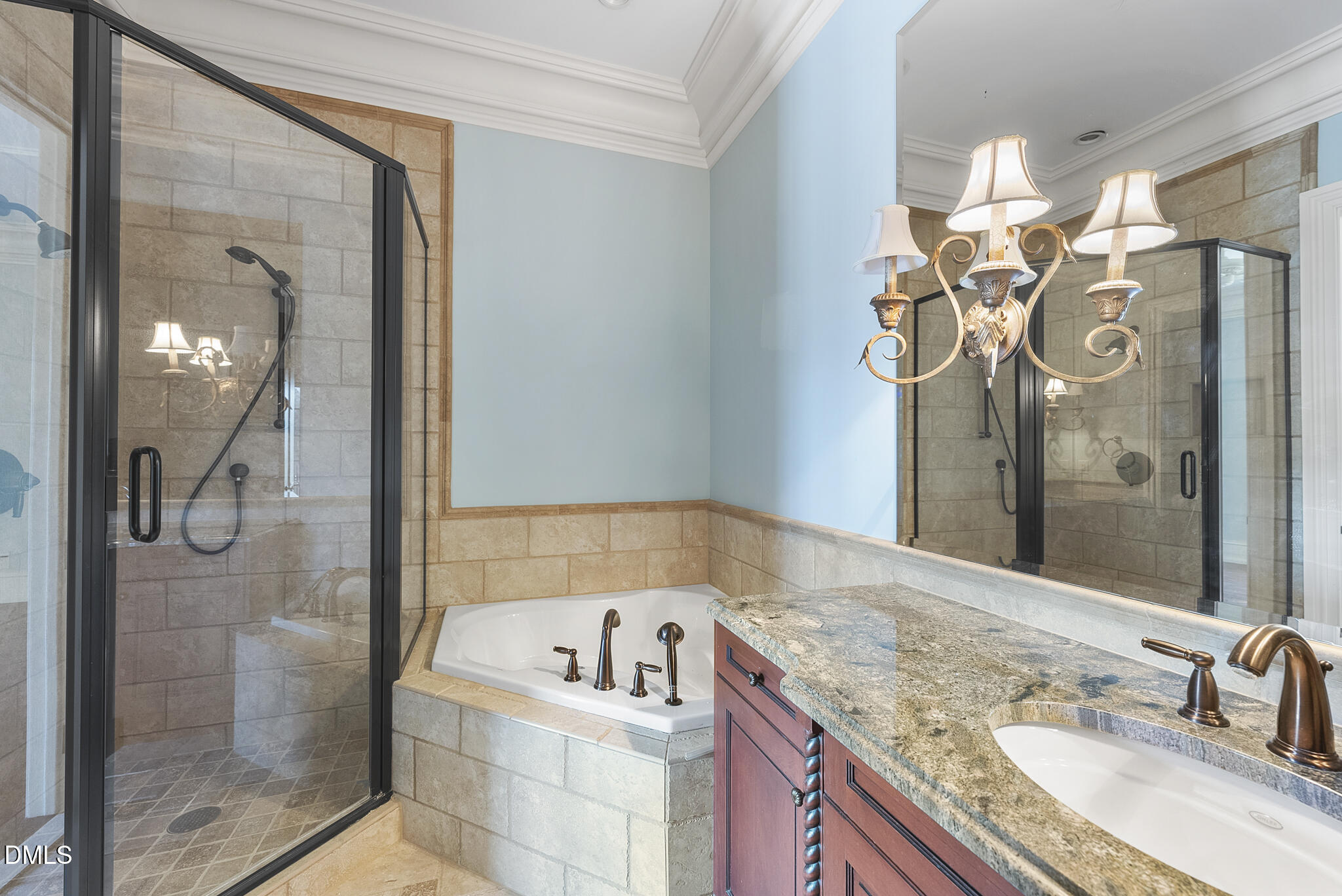 1404 Barony Lake Way Raleigh, NC 27614 - Photo 51 of 66 a bathroom with a granite countertop sink a mirror and a shower