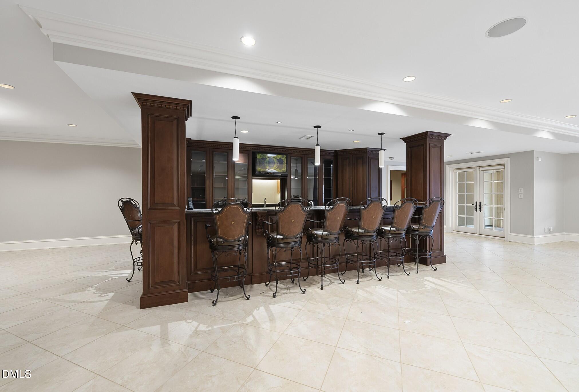 1404 Barony Lake Way Raleigh, NC 27614 - Photo 59 of 66 a living room with furniture a dining table and chairs