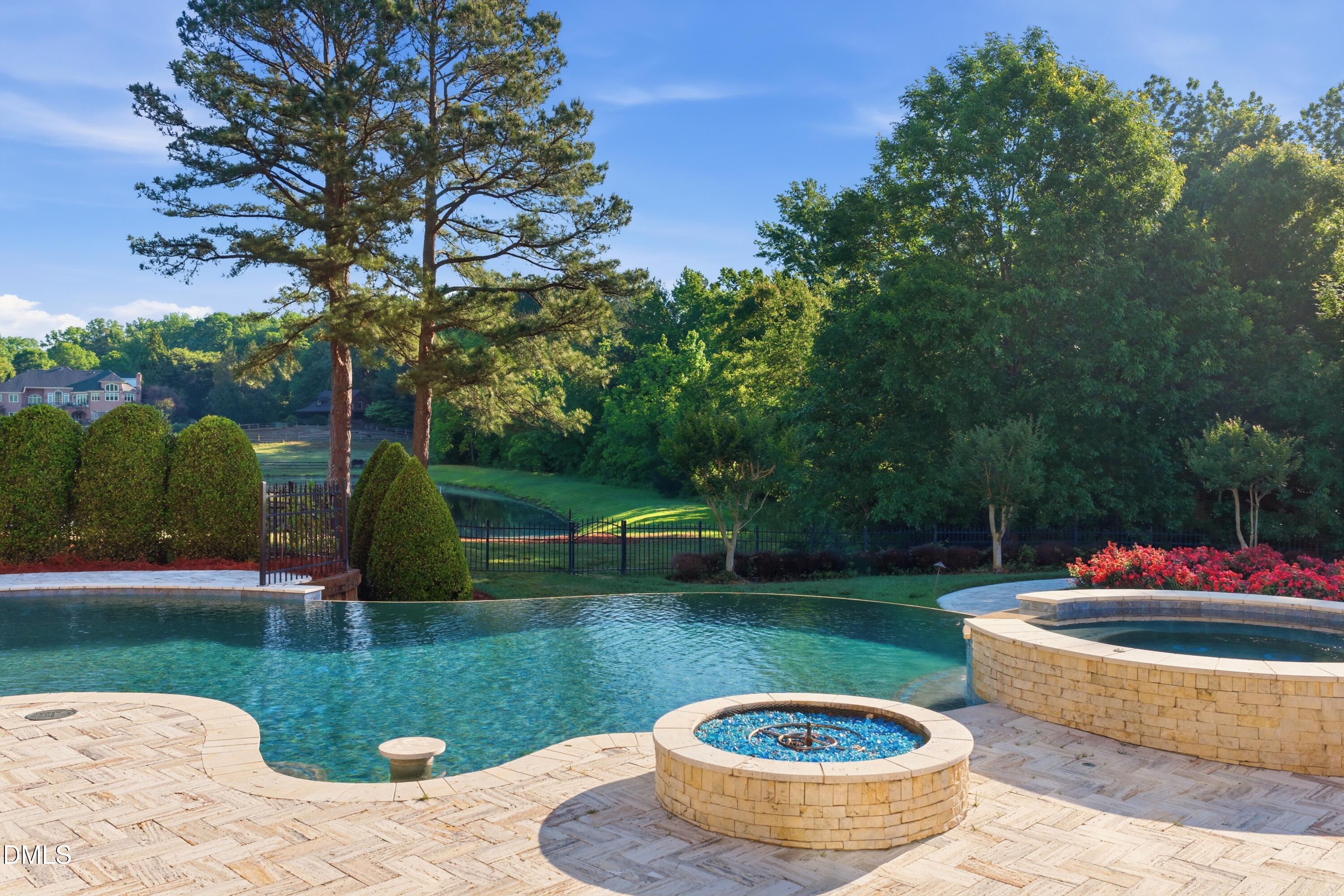 1404 Barony Lake Way Raleigh, NC 27614 - Photo 6 of 66 a view of a fountain in the front of a house