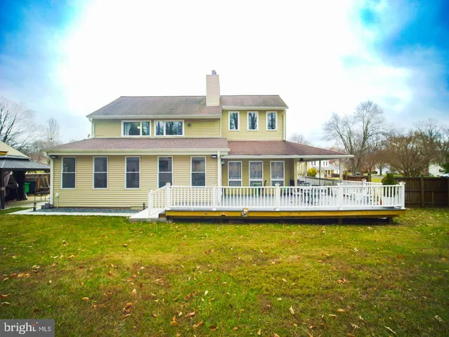 a front view of a house with swimming pool