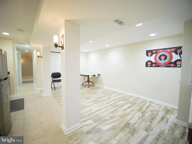 a view of a chairs and table in the patio