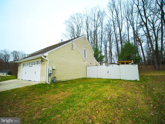 a house with trees in front of it