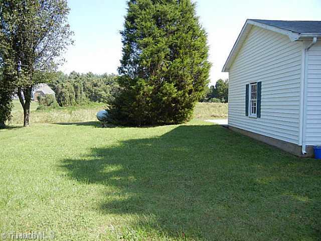 1094 Hickory Tree Road Winston-Salem, NC 27127 - Photo 12 of 16 Yard/Garden. Large level yard for the kids to play or to have a garden.