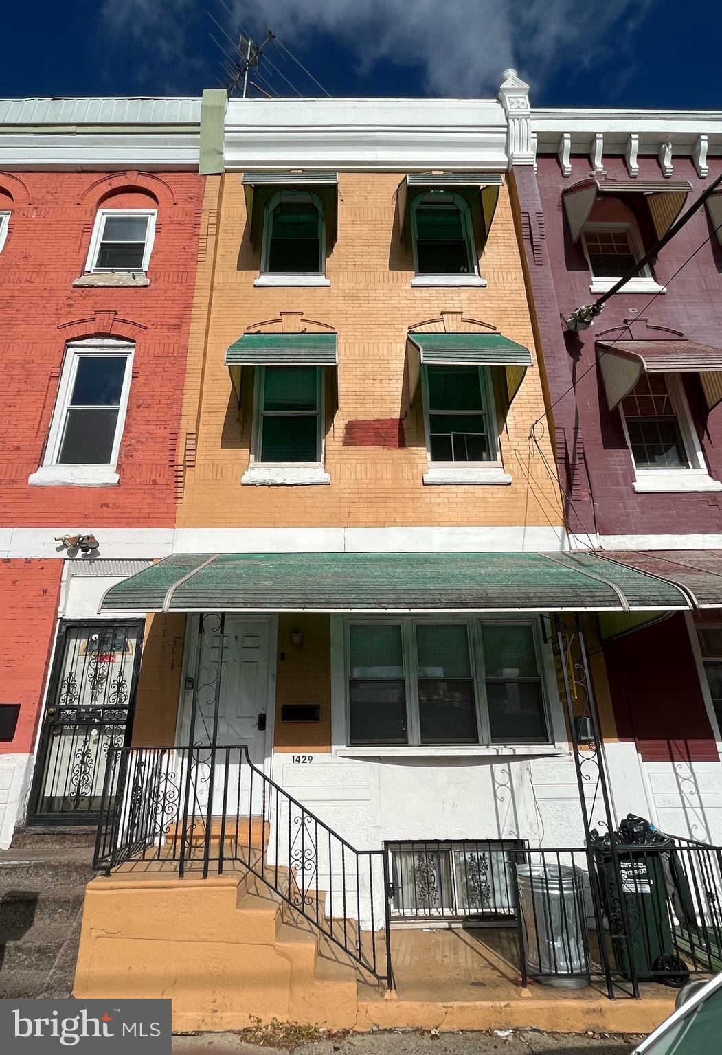 1429 West Norris Street, Unit 1 Philadelphia, PA 19121 - Photo 1 of 15 a view of a building with many windows