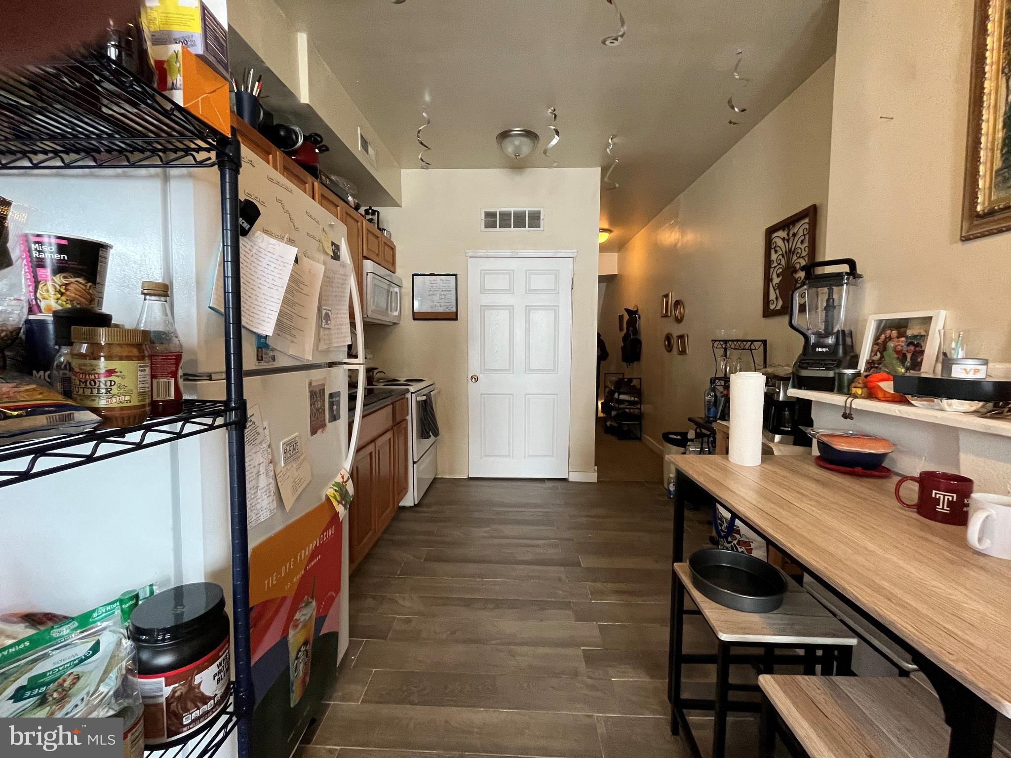 1429 West Norris Street, Unit 1 Philadelphia, PA 19121 - Photo 3 of 15 a hallway with wooden floor