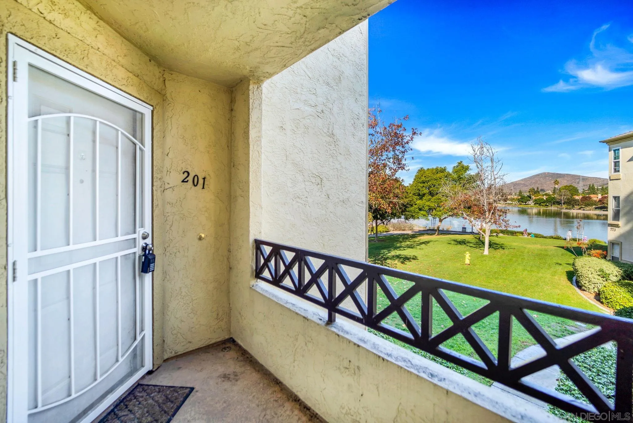 767 Brookstone Road, Unit 201 Chula Vista, CA 91913 - Photo 1 of 56 a view of swimming pool with outdoor seating and yard