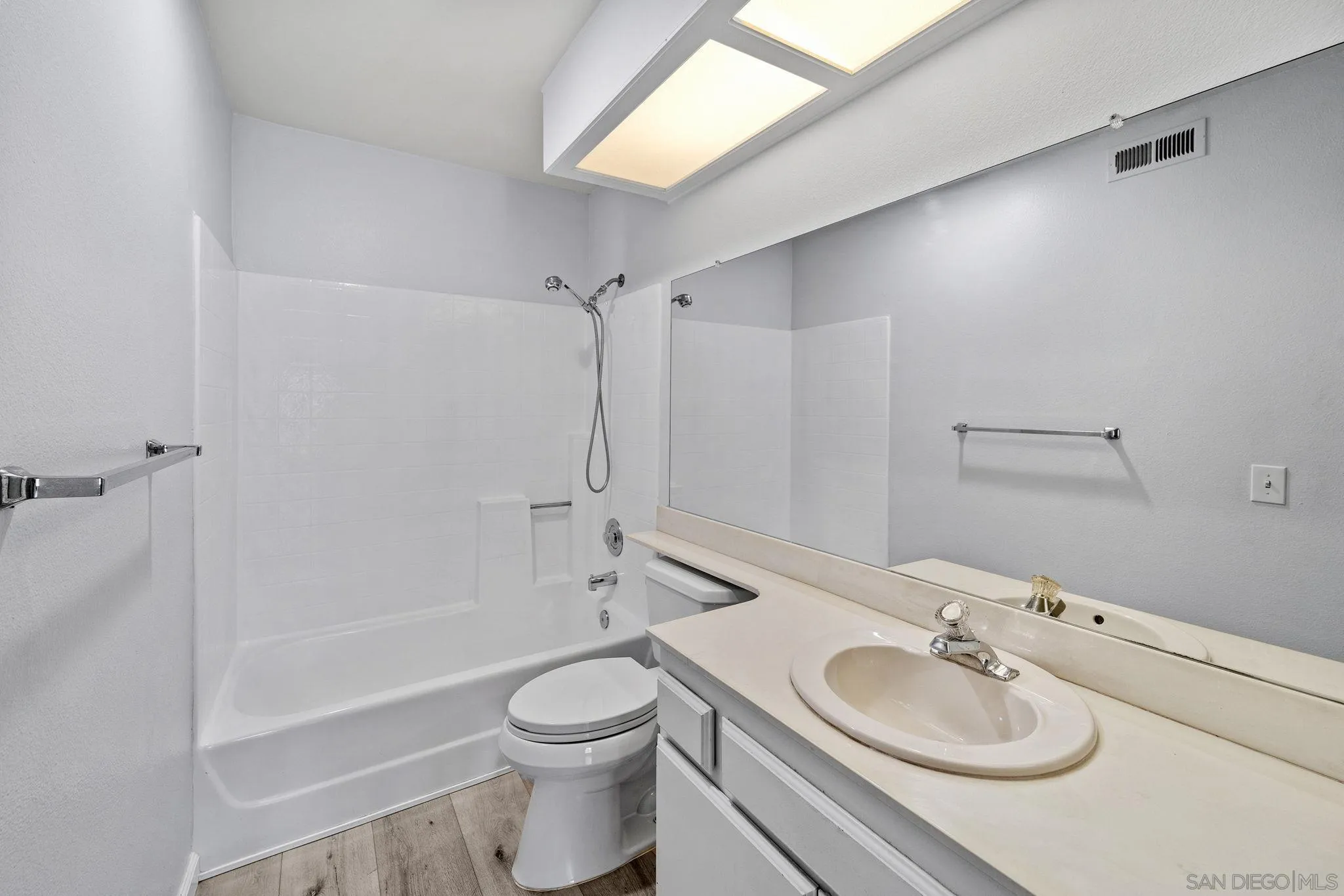 767 Brookstone Road, Unit 201 Chula Vista, CA 91913 - Photo 23 of 56 a bathroom with a sink a toilet and shower