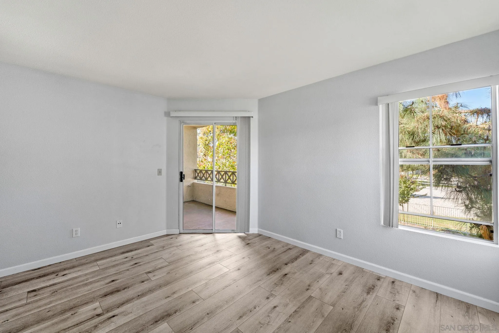 767 Brookstone Road, Unit 201 Chula Vista, CA 91913 - Photo 25 of 56 a view of a room with wooden floor and a window