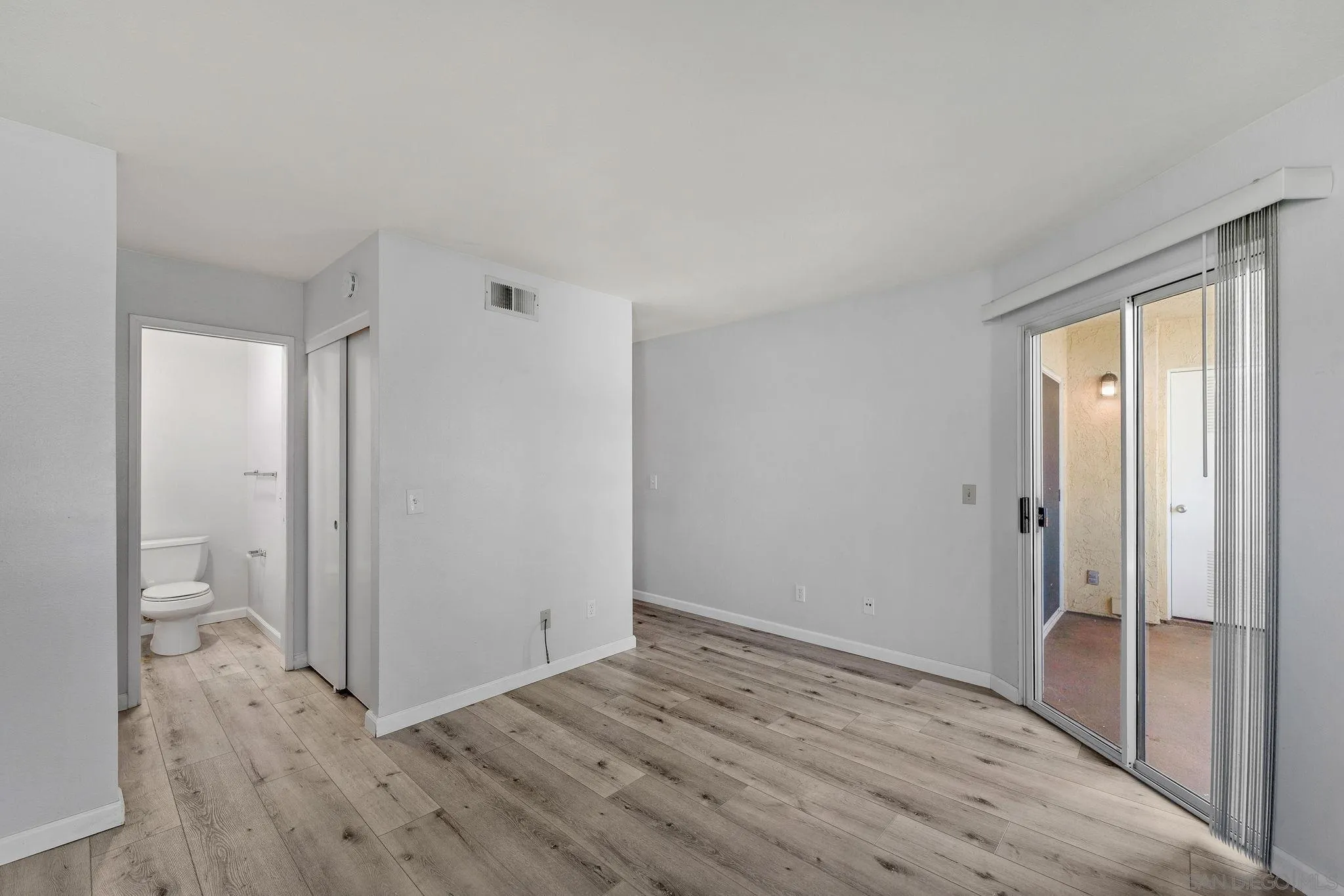 767 Brookstone Road, Unit 201 Chula Vista, CA 91913 - Photo 26 of 56 a view of a room with wooden floor and a bathroom