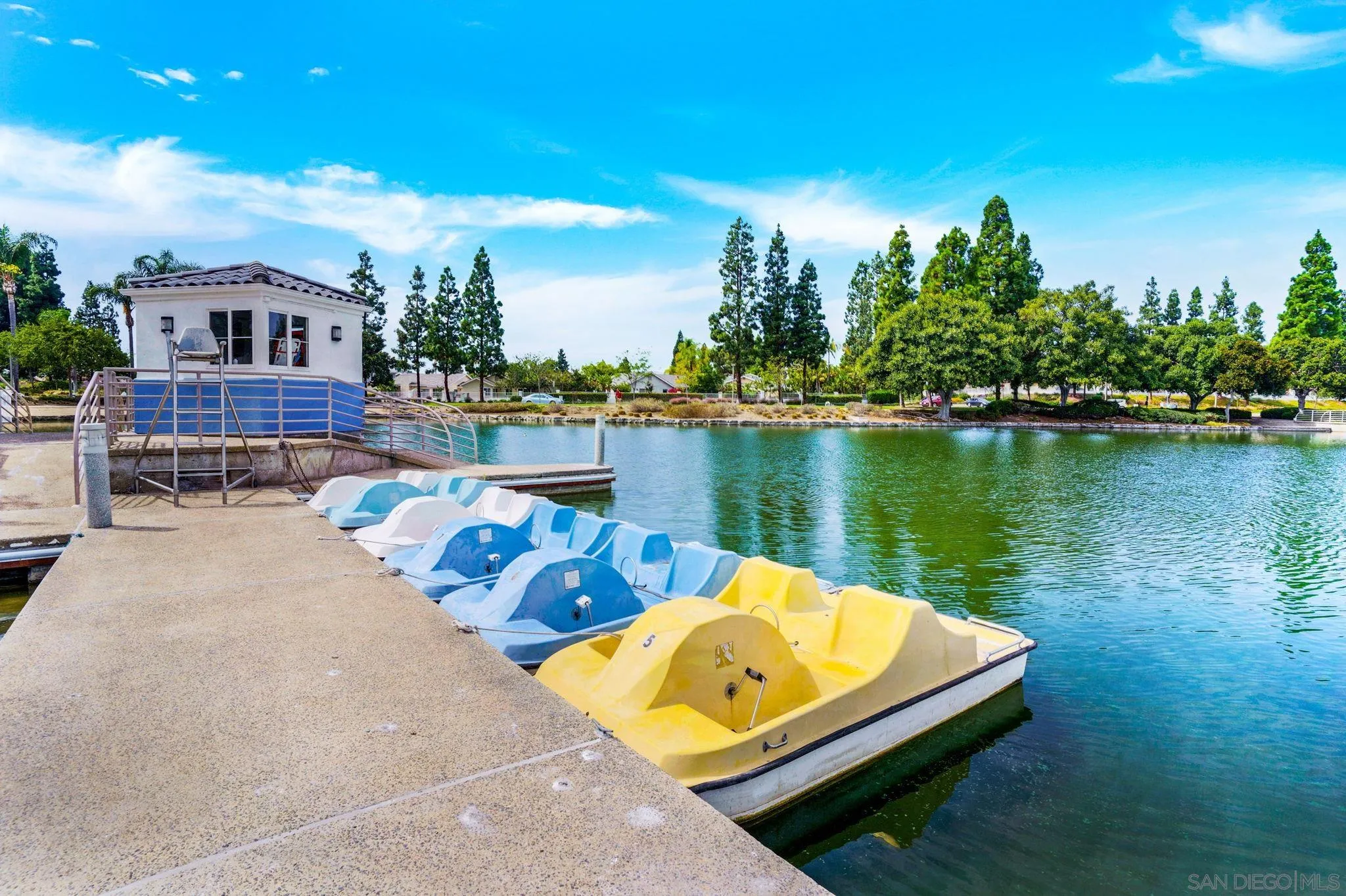 767 Brookstone Road, Unit 201 Chula Vista, CA 91913 - Photo 35 of 56 a view of a lake with a patio