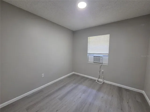 a bathroom with a toilet a sink and bathtub