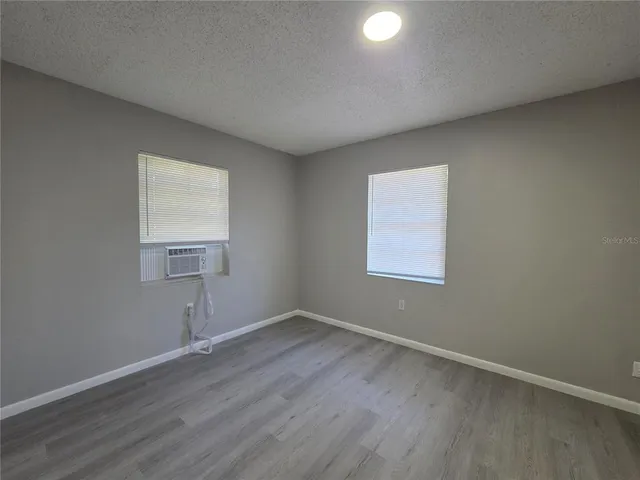 a view of outdoor space with garden and trees