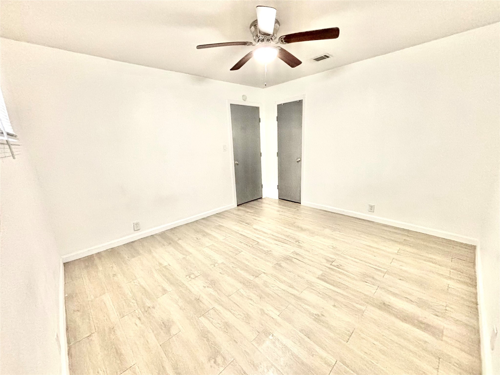8038 Woodlyn Road Houston, TX 77028 - Photo 5 of 10 a view of an empty room